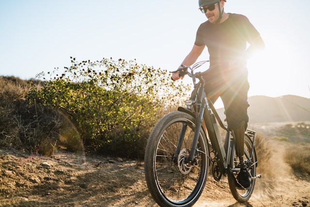 E-bike rider on a dirt road