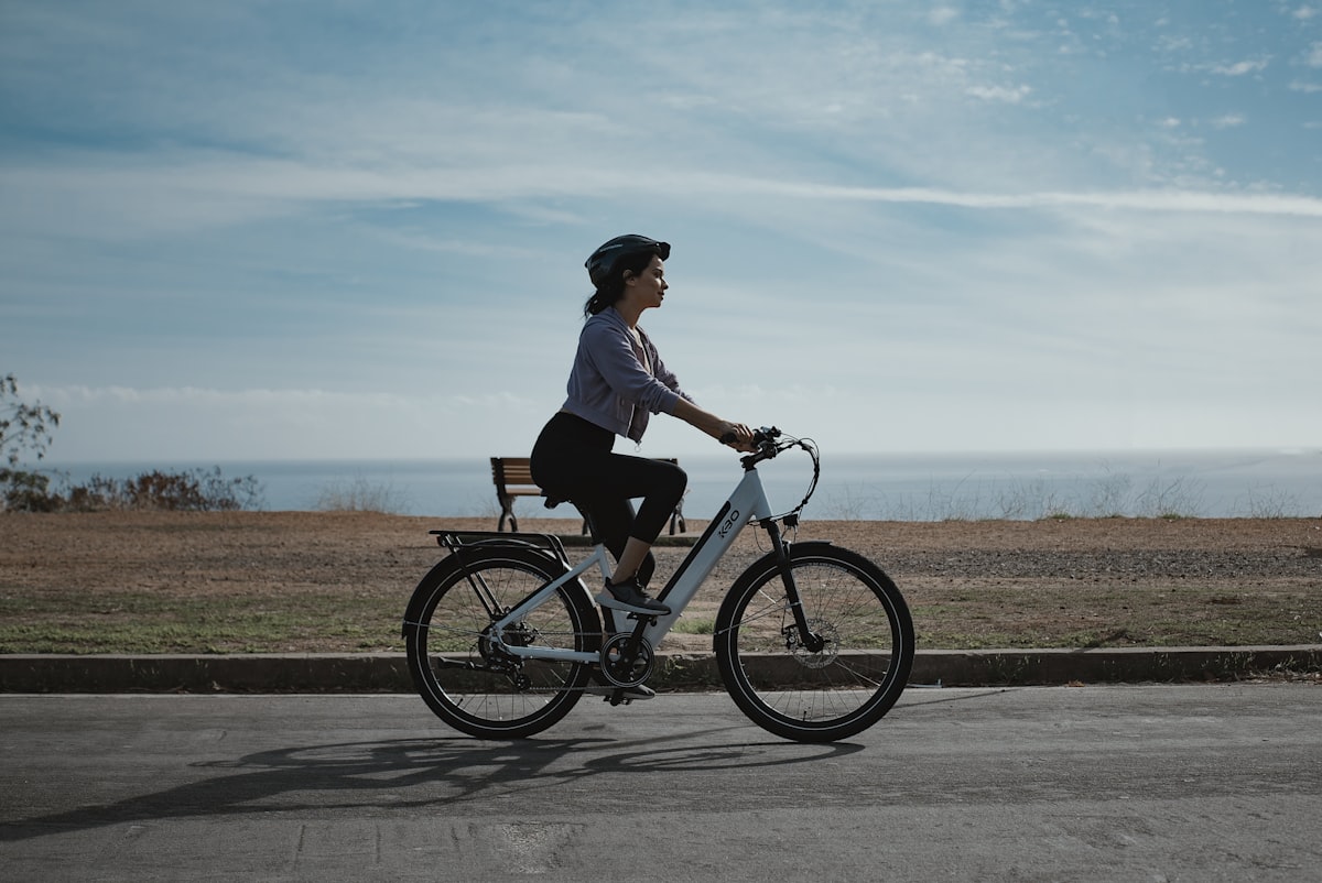 Rider on an electric bicycle on a road