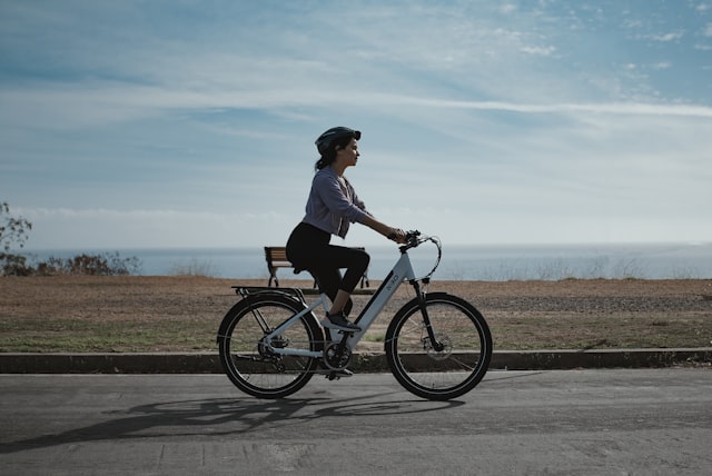 Rider on an electric bicycle on a road