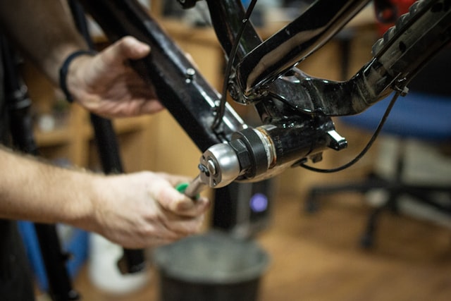 Mechanic working on bike components