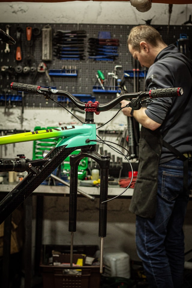 Mechanic repairing a bicycle